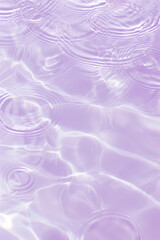 Flat lay water texture ripple pastel lilac background. Spa, cosmetics or summer concept - 785650390