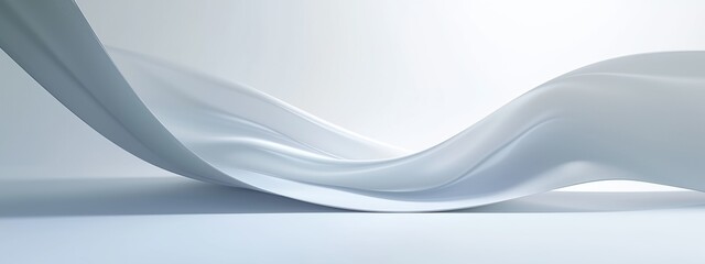 a white flowing fabric on a white background