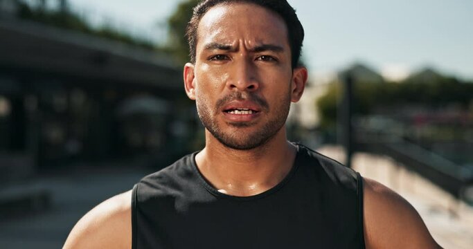 Tired, sweat and portrait of man with fitness for training, break and morning cardio exercise. Exhausted, Asian athlete and person with breathing for rest, running pause and workout fatigue in city