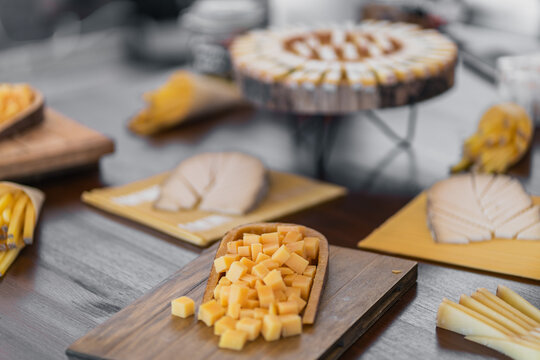 Elegant Cheese Selection on Wooden Boards
