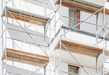 scaffolding on a construction site - 785656365