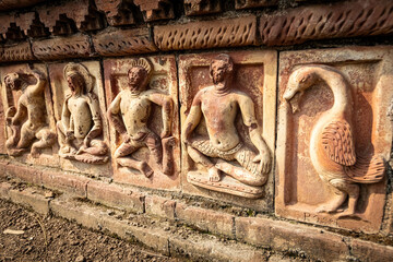 Ancient bas reliefs at Paharpur Buddhist Vihara Museum Unesco Heritage site in Joypurhat Bangladesh - obrazy, fototapety, plakaty