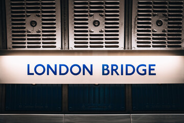 Station name sign on the platform of London Bridge station, London, UK.