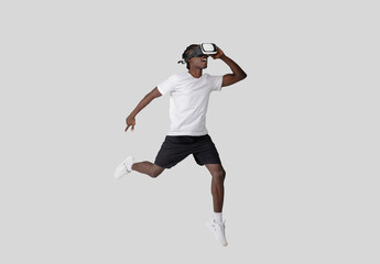 Young man in VR headset with dynamic pose