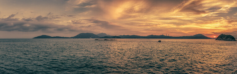 sunset over the ocean lamma island hong kong