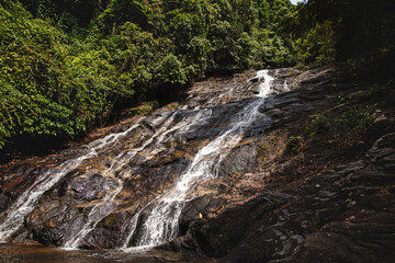 Beautiful Ton Phrai Waterfall in Rainforest of Thailand