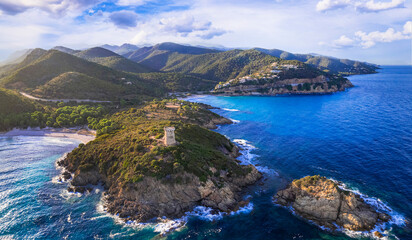 Scenic nature and beaches of Corsica island. Genoese towers  - Torra di Fautea over sunset. aerial drone panoramic view - obrazy, fototapety, plakaty