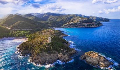  Scenic nature and beaches of Corsica island. Genoese towers  - Torra di Fautea over sunset. aerial drone panoramic view © Freesurf