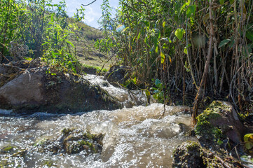 serene river flow among majestic mountain landscapes. Experience the awe-inspiring beauty of nature in all its glory. Breathe in the fresh mountain air and let your worries wash away