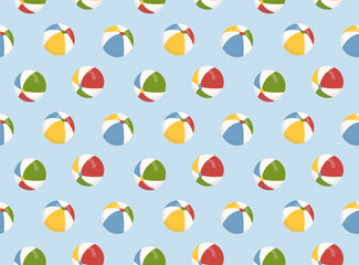 Colorful beach balls scattered across a light blue backdrop, capturing the essence of playful summer days and fun at the seaside
