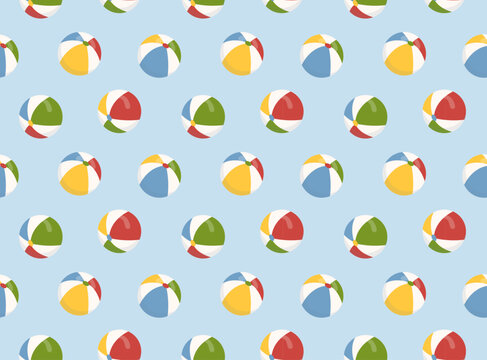 Colorful beach balls scattered across a light blue backdrop, capturing the essence of playful summer days and fun at the seaside
