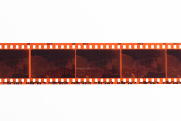 35mm positive filmstrips with empty frames, real scan of film material with cool scanning light interferences on the material.  - obrazy, fototapety, plakaty