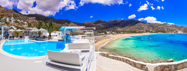 Greek summer holidays. Best beaches of Ios island - Mylopotas with crystal clear waters. Creece, Cyclades. - 785702907