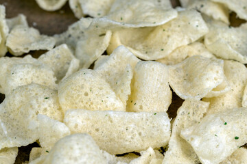 crispy potato chips with spices on the table