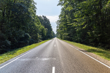 Fototapeta premium Narrow paved road for cars