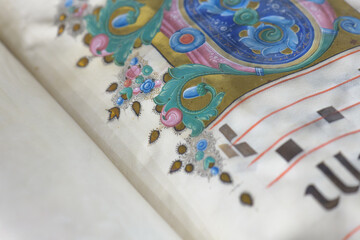 Detail with initial letter from illuminated antiphonary manuscrip