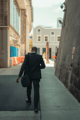 man walking in the street business miami 