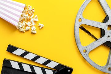 Cinema concept with film reels and popcorn. Movie background - 785718106