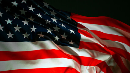 Closeup of American flag on black background, freeze motion