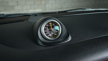 Clock on a car dashboard