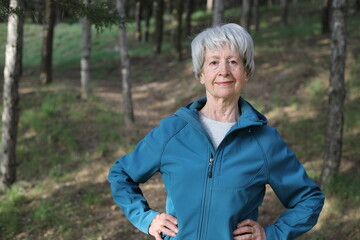 Healthy looking senior woman in nature 