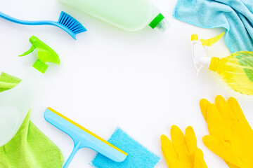 Chemical cleaning supplies bottles with rubber gloves. Cleaning service concept - 785722544