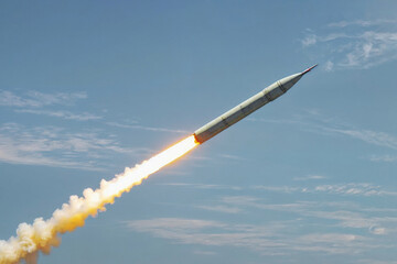 A large military ballistic rockets are take off in the blue sky. War concept - Powered by Adobe