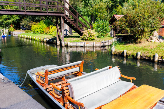 Scenic view of green riverside garden house german national park Spreewald on spring summer sunny day . Spree river forest greenery canal nature tranquil landscape in Germany blue sky background