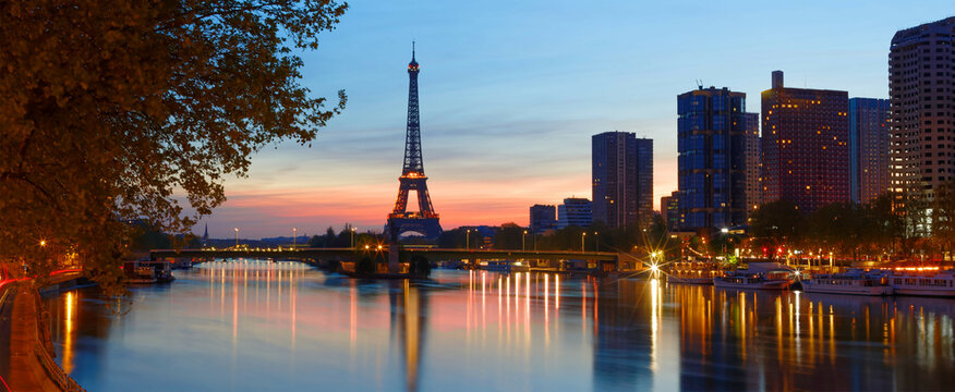 Amazing panoramic image of sunrise at the Eiffel tower in spring in Paris.
