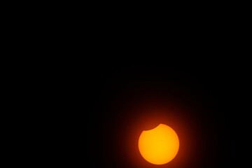View of a Partial Solar Eclipse, After Third Contact, Sun Seen with Solar Filter, April 8, 2024,...