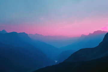 Majestic Mountain Range at Dusk with Pink Skies and Misty Valleys