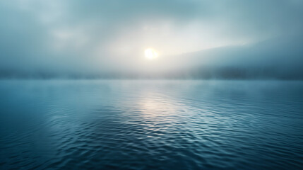 A calm body of water with a sun reflecting on the surface
