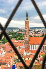 Panoramic view of Landshut from Trausnitz castle. Old town and cathedrals, architecture, roofs of houses, streets landscape, Landshut, Germany. vertical photo