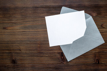 Blank sheet of paper on an envelope for letters. Space for text, top view
