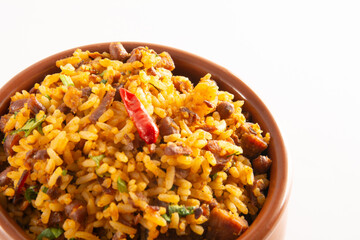 Baião de Dois traditional Brazilian food made with rice, beans, sausage and rennet cheese