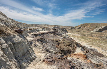 Eroded badlands in a valley at Red Rock Coulee near the town of Severn Persons, Alberta, Canada