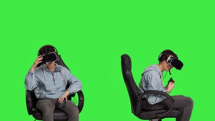 Woman gamer losing and winning at mobile video games against greenscreen backdrop, playing with...