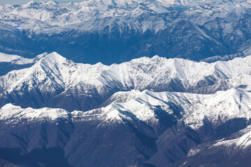 Aerial view of Himalaya mountains. View from airplane window