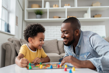 Bonding over board games, African American father and son enjoy quality time at home.