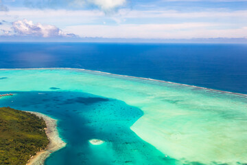 Bora Bora Island in Tahiti, French Polynesia. Travel, lifestyle, freedom and luxury concept. Aerial view. - obrazy, fototapety, plakaty