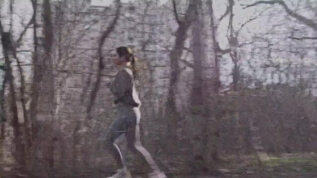 Girl in tight tights doing light jogging in park