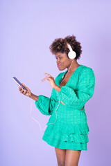 Woman Wearing Headphones and Green Dress