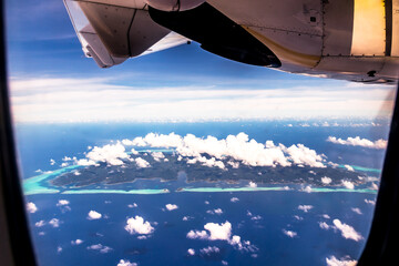 Naklejka na ściany i meble Bora Bora Island in Tahiti, French Polynesia. Travel, lifestyle, freedom and luxury concept. Aerial view.
