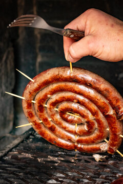 chorizo argentino on the grill, Salchica asada, roast sausage