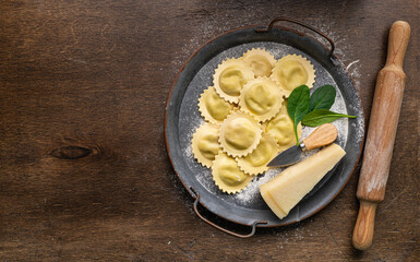 Ravioli with cheese and spinach, italian food, top view, copy space