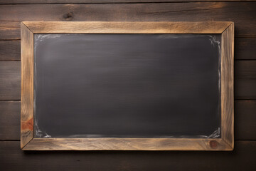 Vintage slate chalk board on wooden background copy space for text