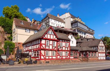 Medieval street with traditional half-timbered houses, Marburg an der Lahn, Hesse, Germany - obrazy, fototapety, plakaty
