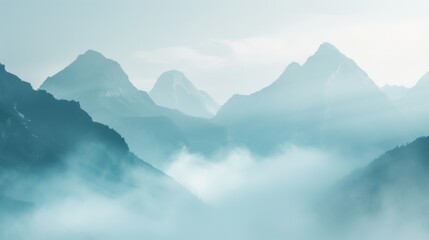 A hazy and blurred background image featuring towering mountains veiled in a thick fog evoking a sense of mystery and wonder. . - obrazy, fototapety, plakaty