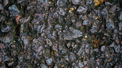 Close up black asphalt an cover