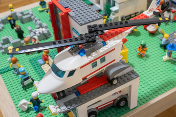 Fototapeta premium Prague, CZ -15.4.2024: A helicopter crafted from LEGO bricks sparks imaginative play in kids, offering a creative outlet for constructing and exploring aerial adventures. Editorial